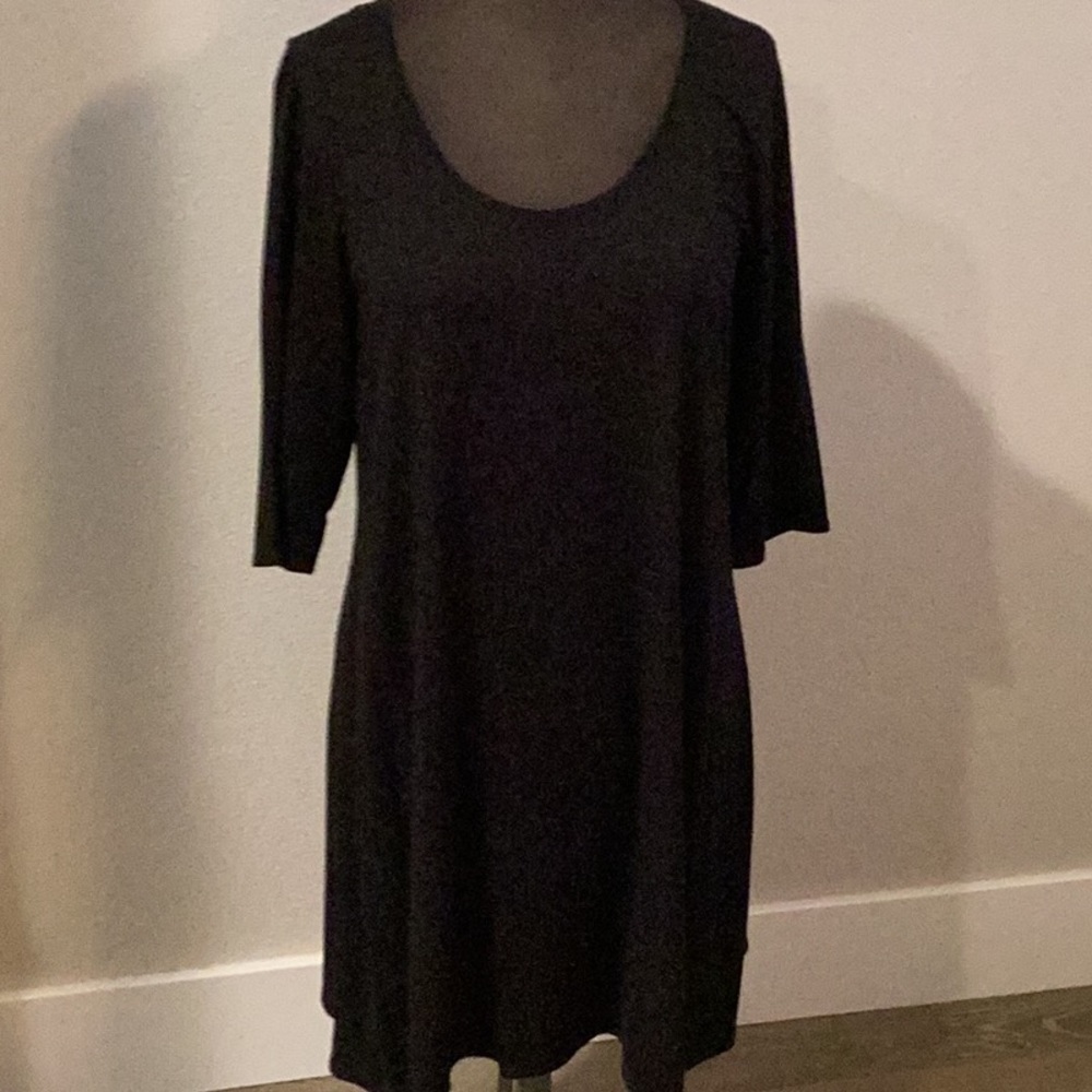 Eileen Fisher long black tunic . With 3/4 sleeves.